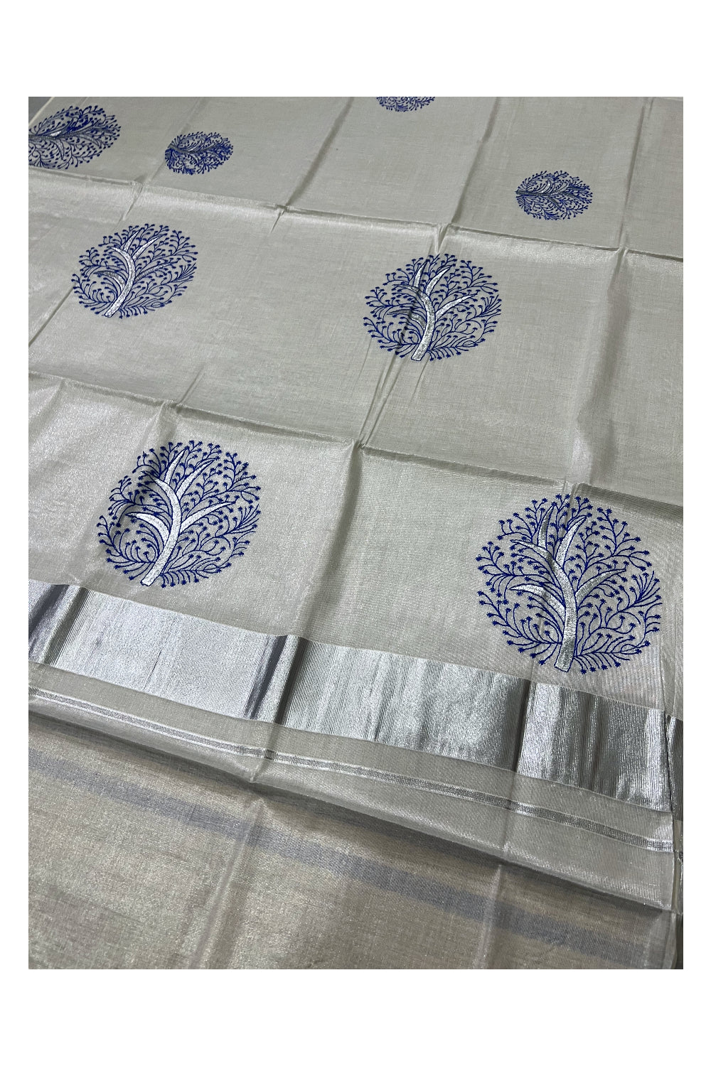 Kerala Silver Tissue Kasavu Saree with Blue Floral Thread works