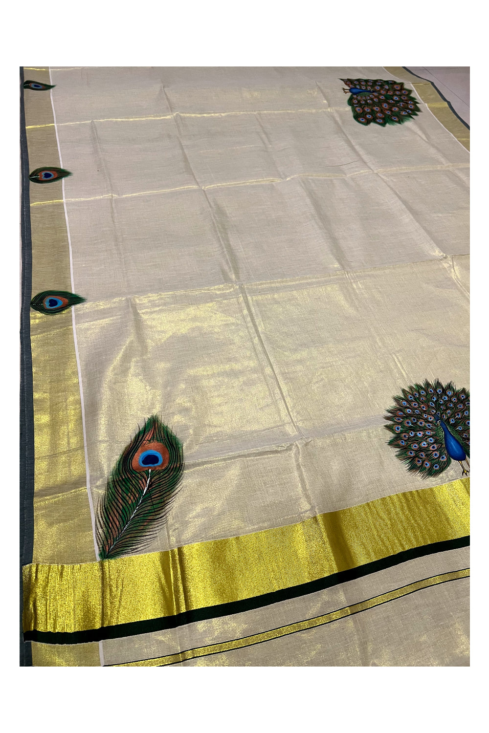 Kerala Tissue Kasavu Saree with Hand Painted Peacock Design and Dark Green Tassels Work