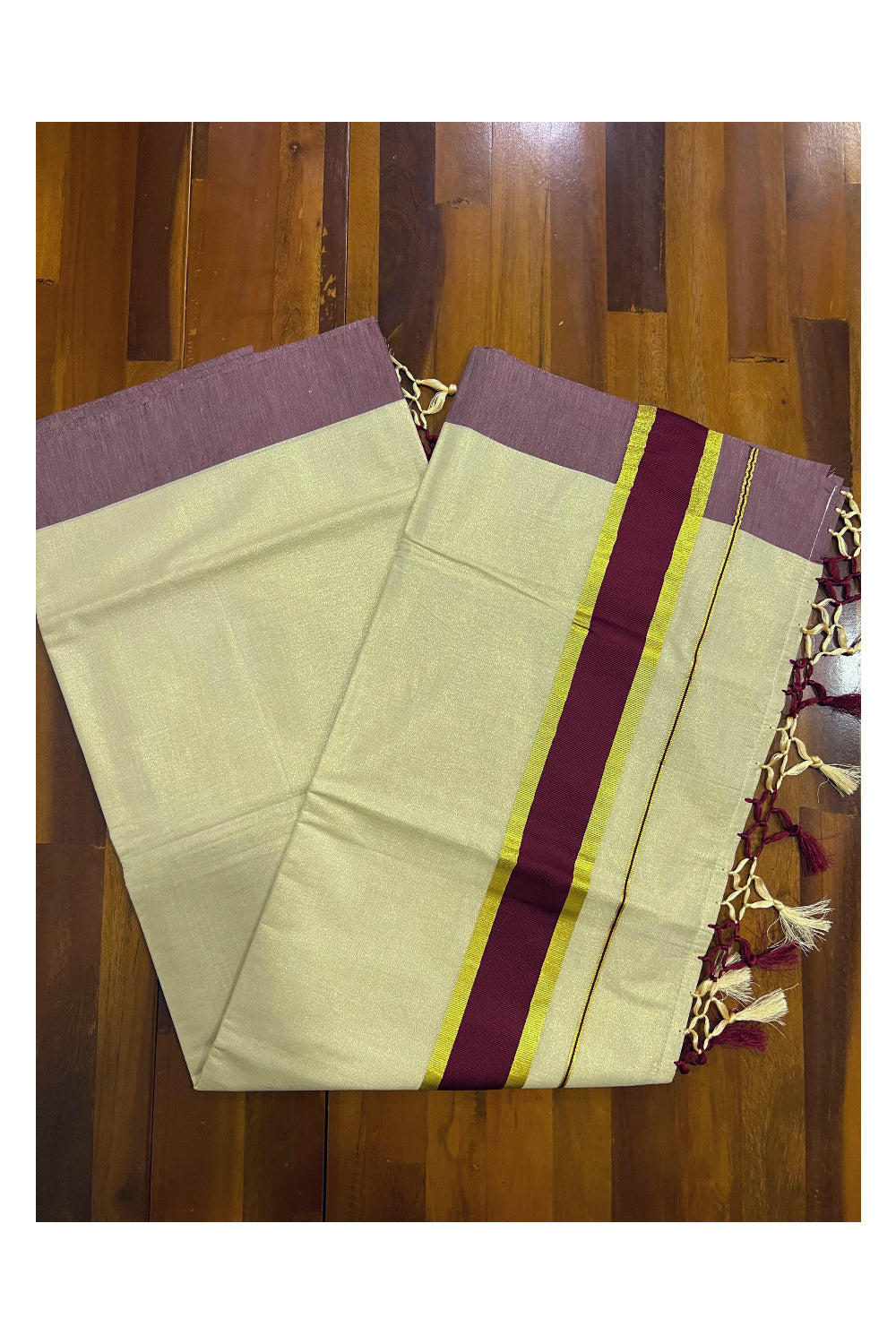 Kerala Kasavu Tissue Plain Saree with Maroon and Kasavu Border and Tassels Work on Pallu