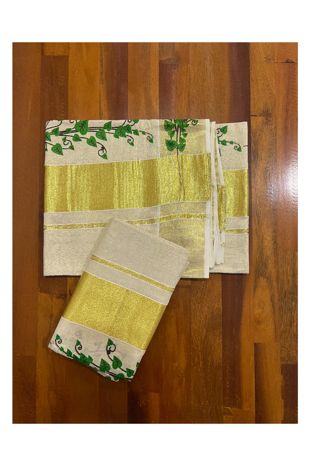 Kerala Tissue Kasavu Set Mundu (Mundum Neriyathum) with Green Leaf Mural Works