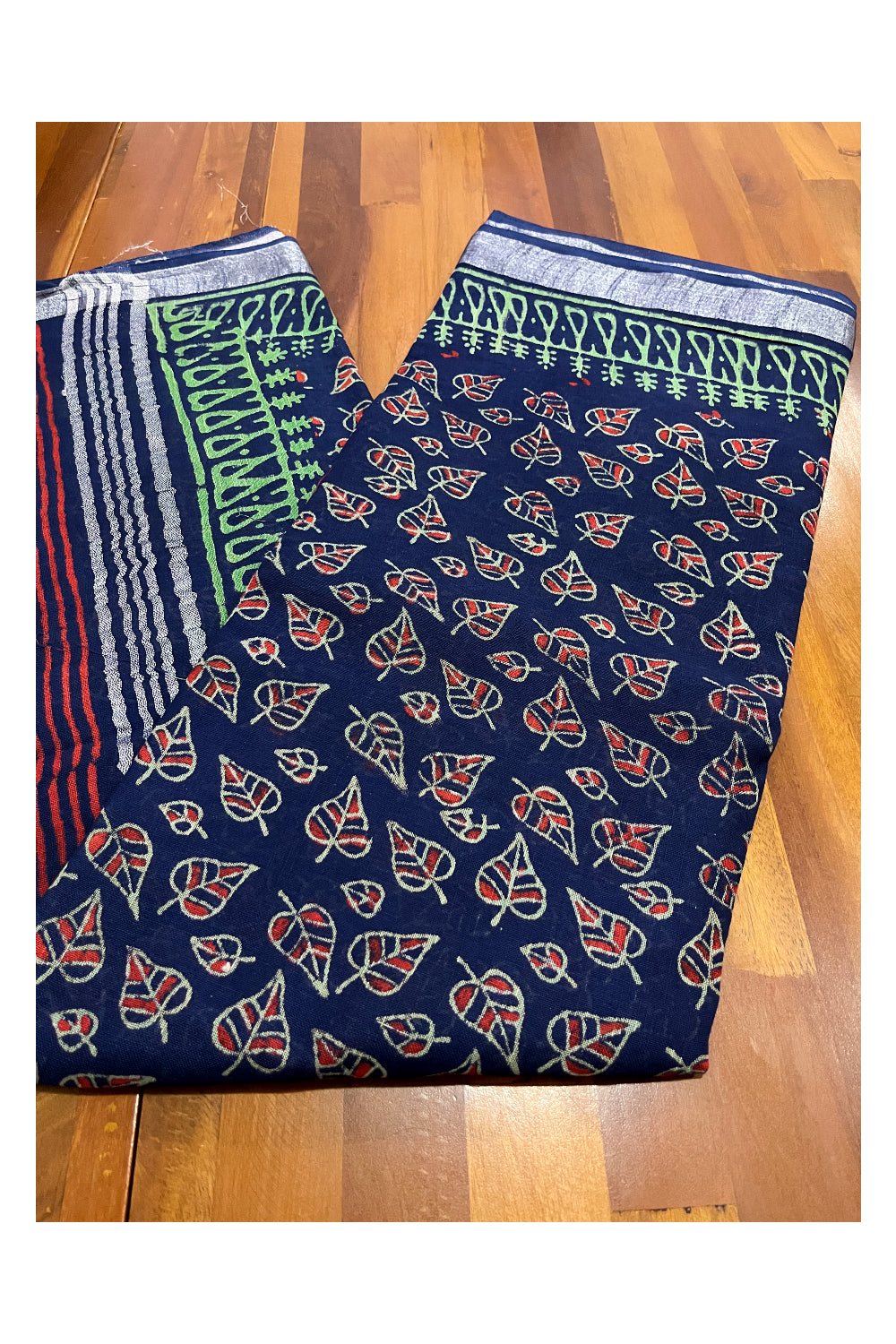 Southloom Linen Designer Blue Saree with Red Green Fabric Prints on Body and Tassels Works