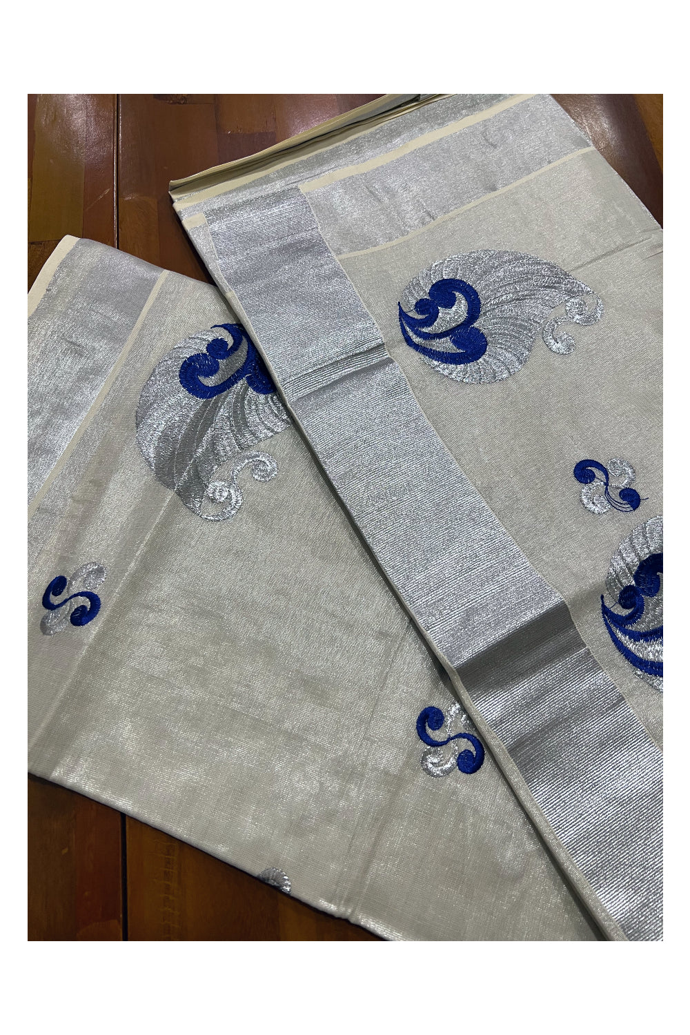 Kerala Silver Tissue Kasavu Saree with Blue Paisley Thread works