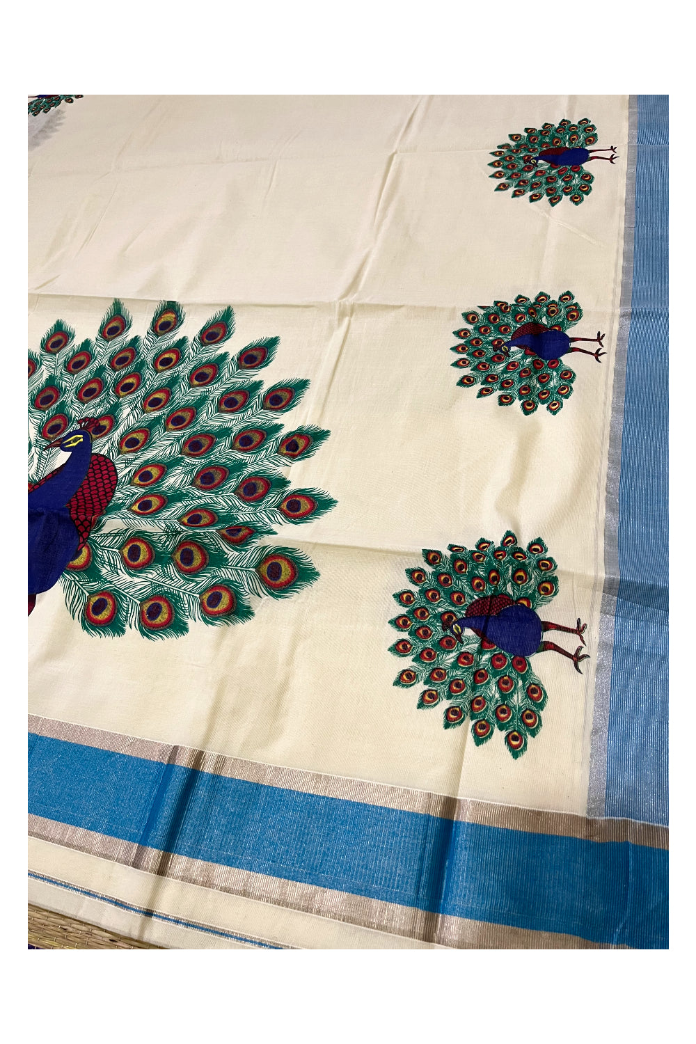 Pure Cotton Kerala Saree with Peacock Mural Prints and Silver Blue Border