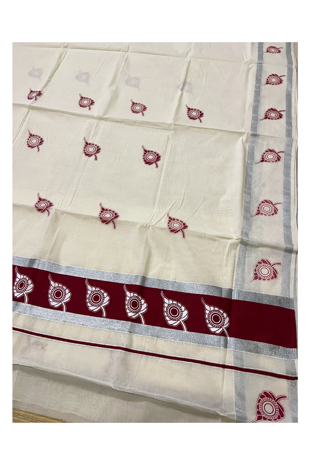 Pure Cotton Kerala Silver Kasavu Saree with White Leaf Block Printed Design in Maroon Pallu