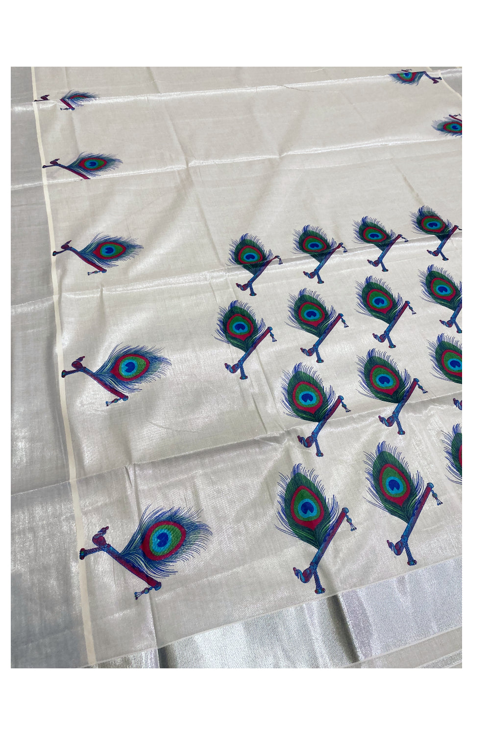 Kerala Silver Tissue Kasavu Saree with Feather and Flute Mural Prints