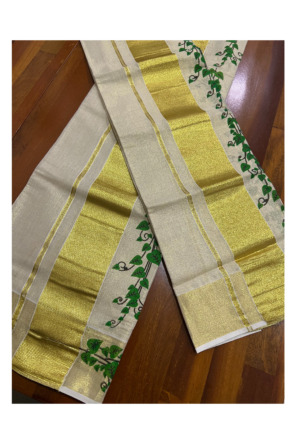 Kerala Tissue Kasavu Set Mundu (Mundum Neriyathum) with Green Leaf Mural Works