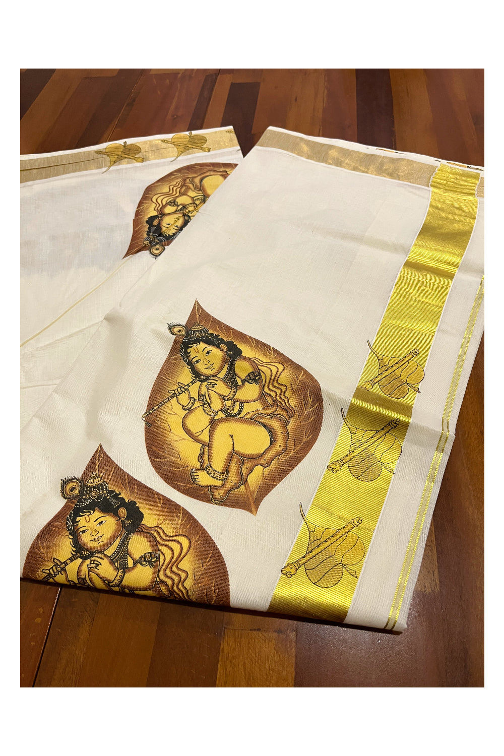 Kerala Pure Cotton Saree with Krishna on Leaf Mural Prints and Printed Kasavu Border