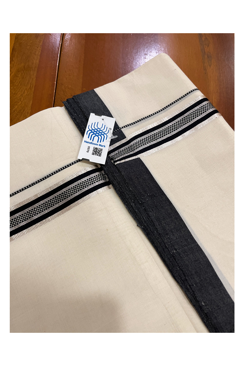 Southloom Premium Unakkupaavu Handloom Mundu with Silver Kasavu and Black Border (South Indian Dhoti)