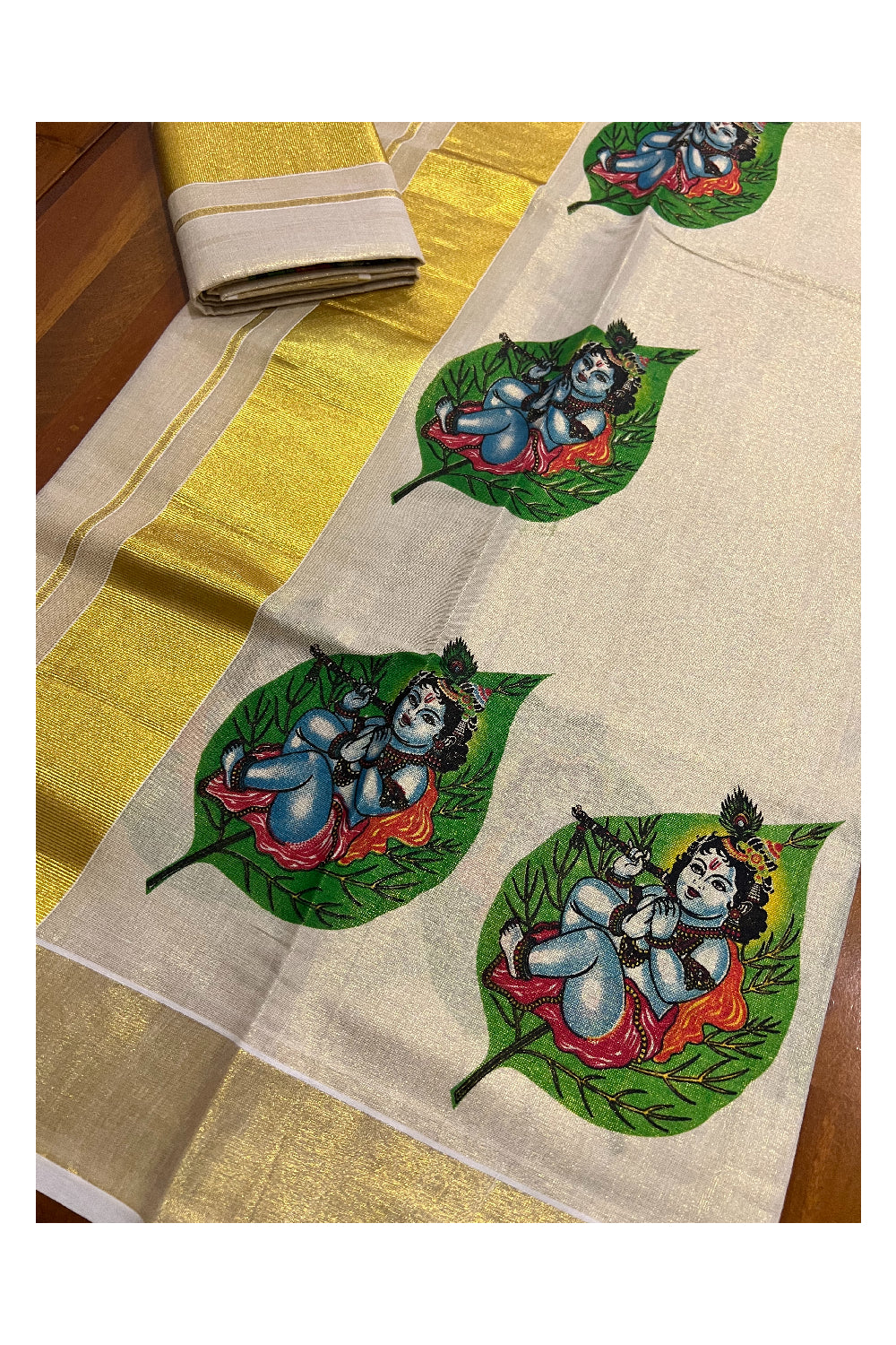 Kerala Tissue Kasavu Set Mundu (Mundum Neriyathum) with Krishna on Leaf Mural Printed Design