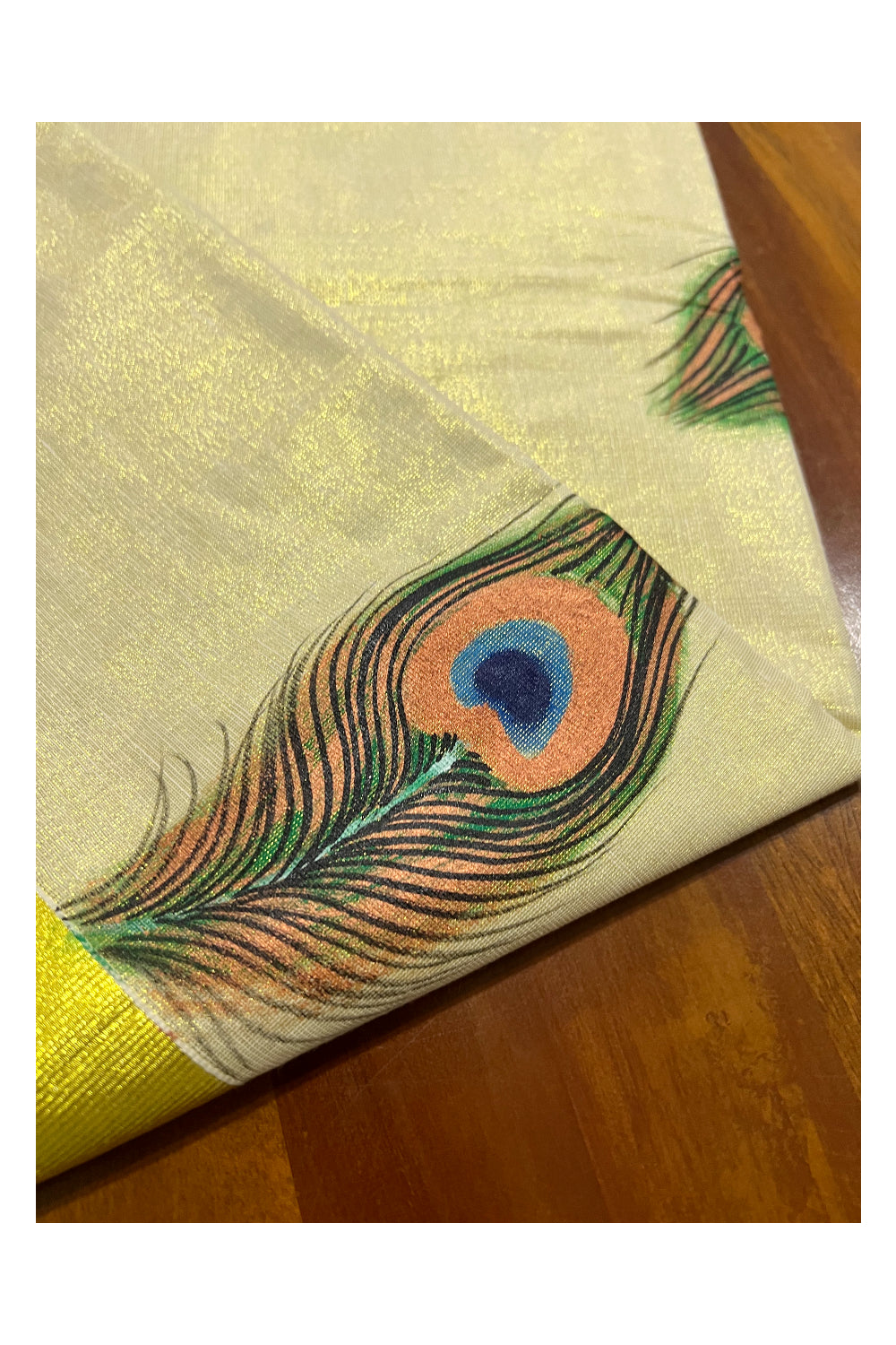 Kerala Tissue Kasavu Saree with Hand Painted Feather Design and Red Line on Border