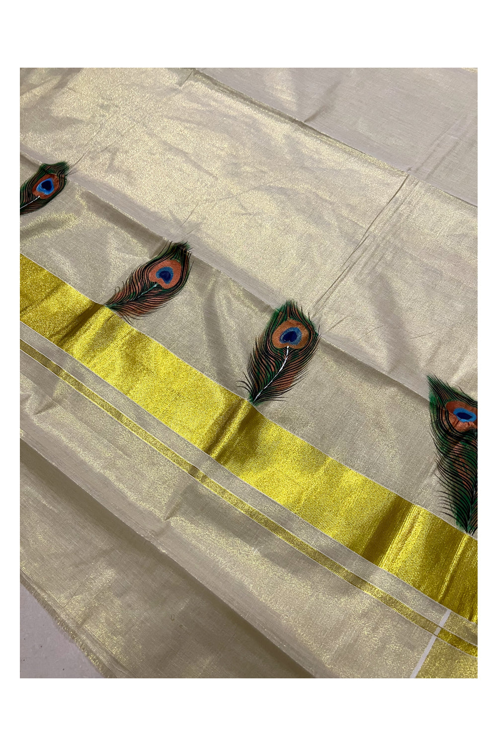 Kerala Tissue Kasavu Saree with Hand Painted Feather Design and Red Line on Border