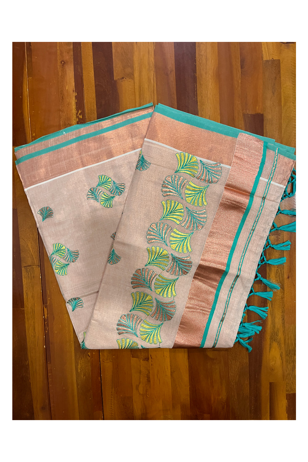 Southloom Copper Tissue Kasavu Saree with Embroidery Design and Turquoise Tassels Works on Pallu