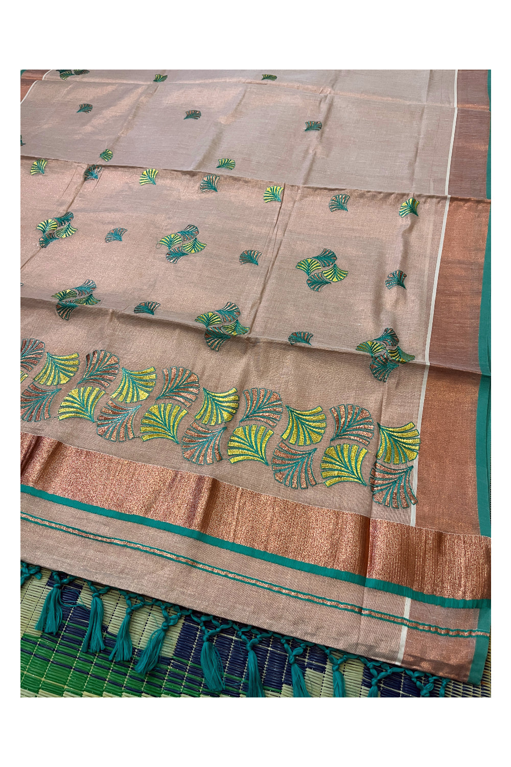 Southloom Copper Tissue Kasavu Saree with Embroidery Design and Turquoise Tassels Works on Pallu