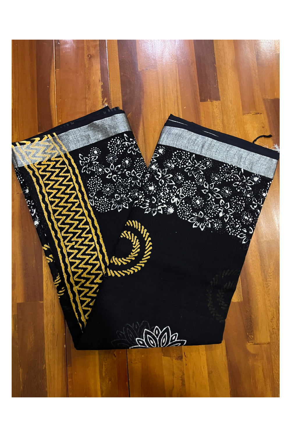 Southloom Linen Designer Black Saree with Yellow White Fabric Prints on Body and Tassels Works