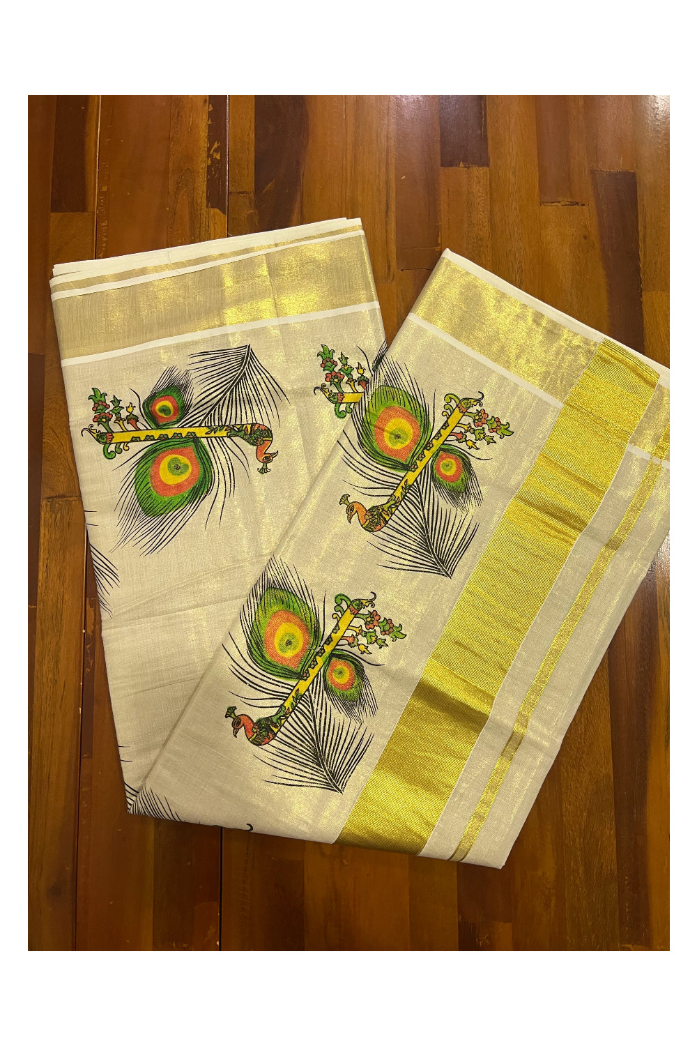Kerala Tissue Kasavu Saree With Mural Printed Feather and Flute Design