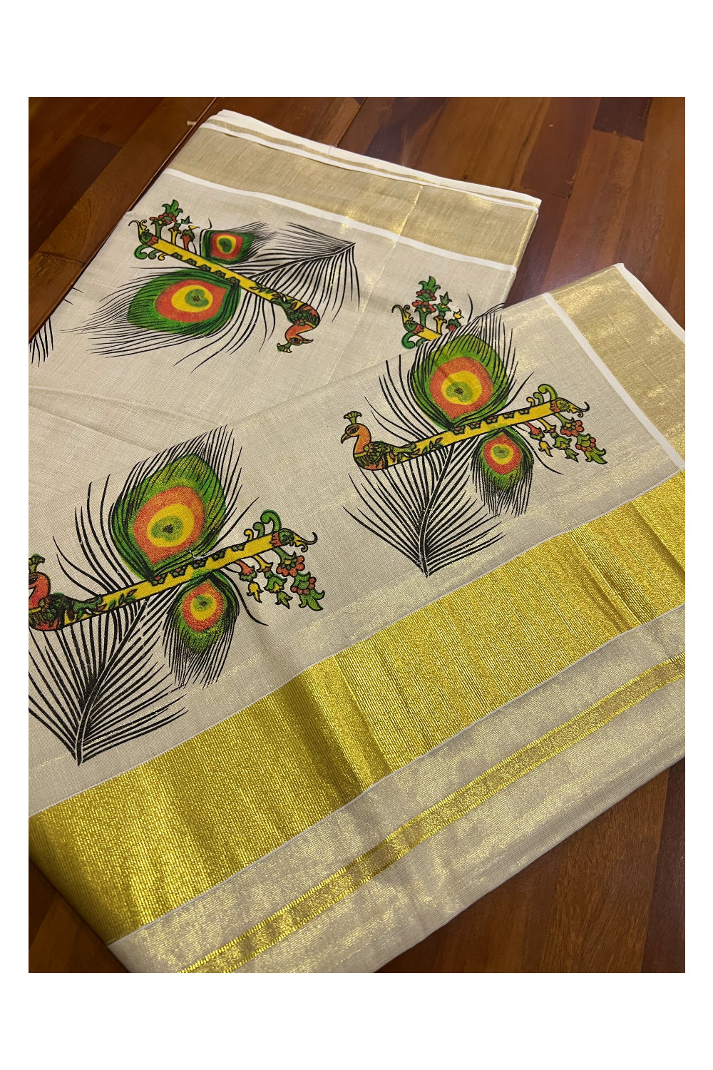 Kerala Tissue Kasavu Saree With Mural Printed Feather and Flute Design