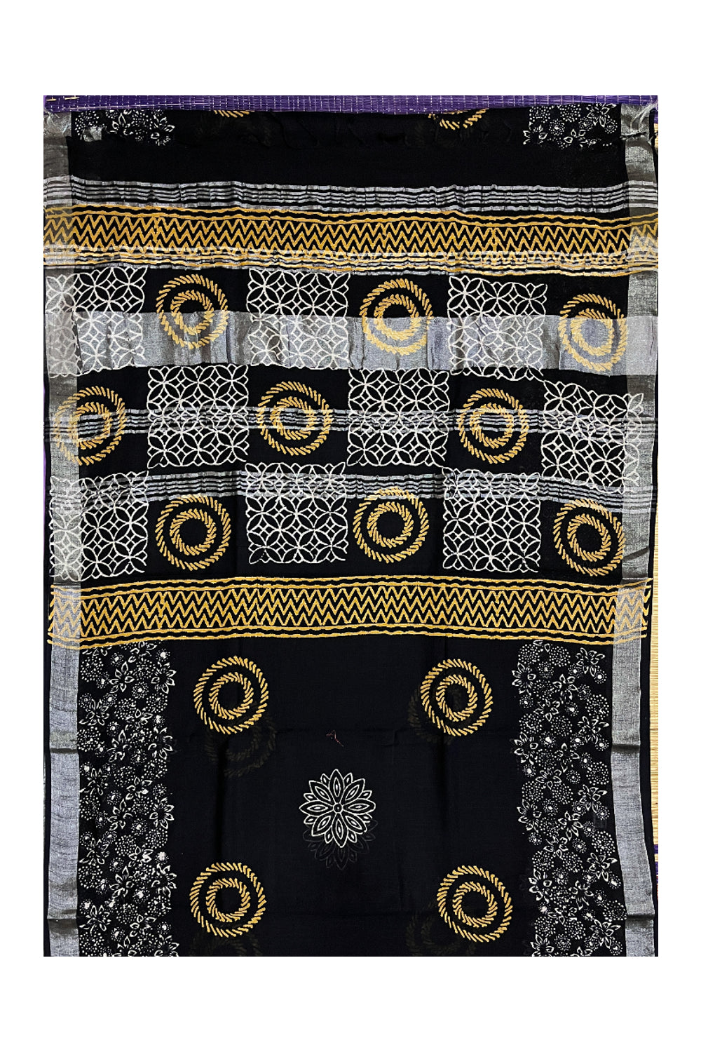 Southloom Linen Designer Black Saree with Yellow White Fabric Prints on Body and Tassels Works