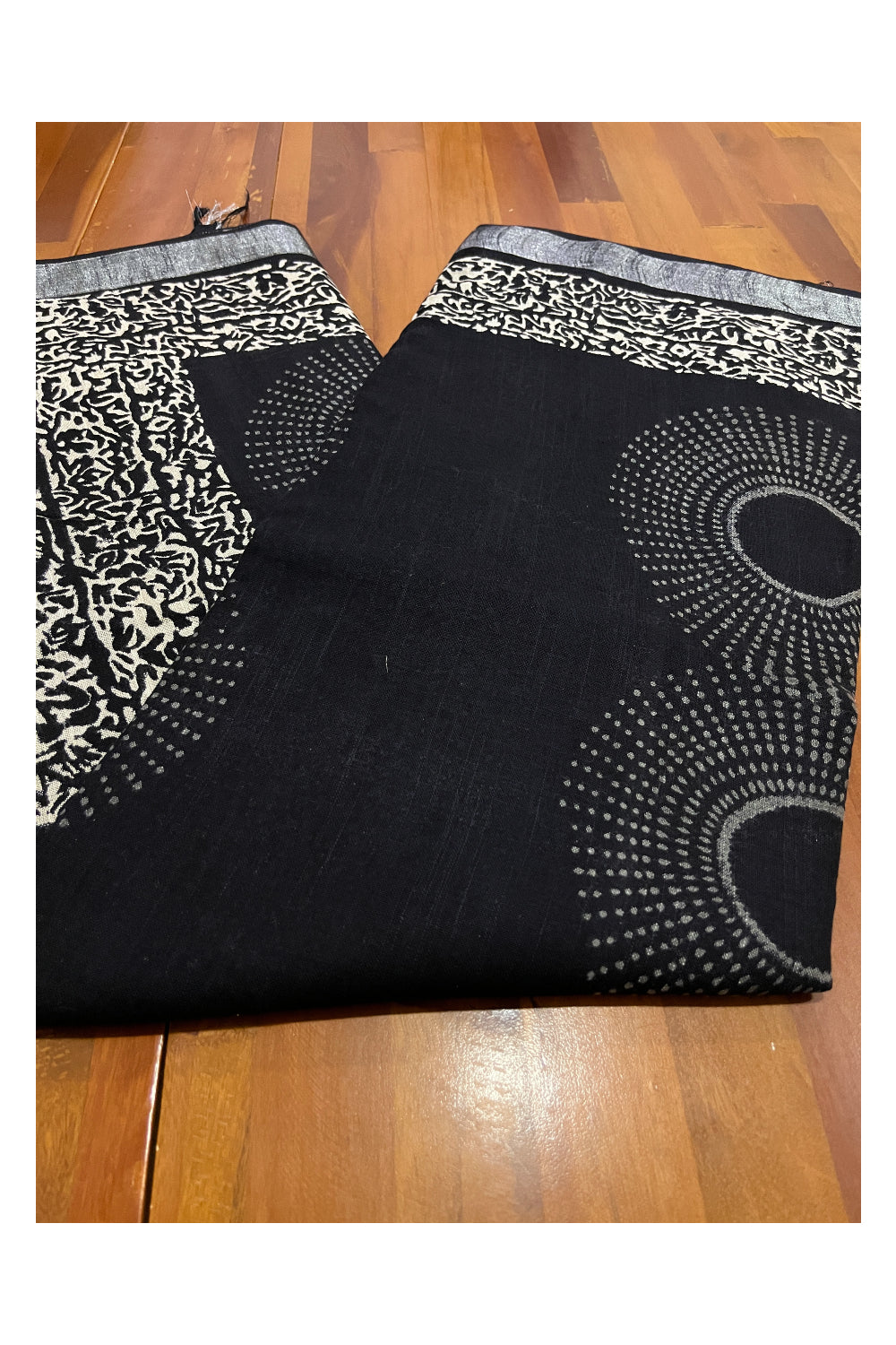 Southloom Linen Designer Black Saree with White Fabric Prints on Body and Tassels Works