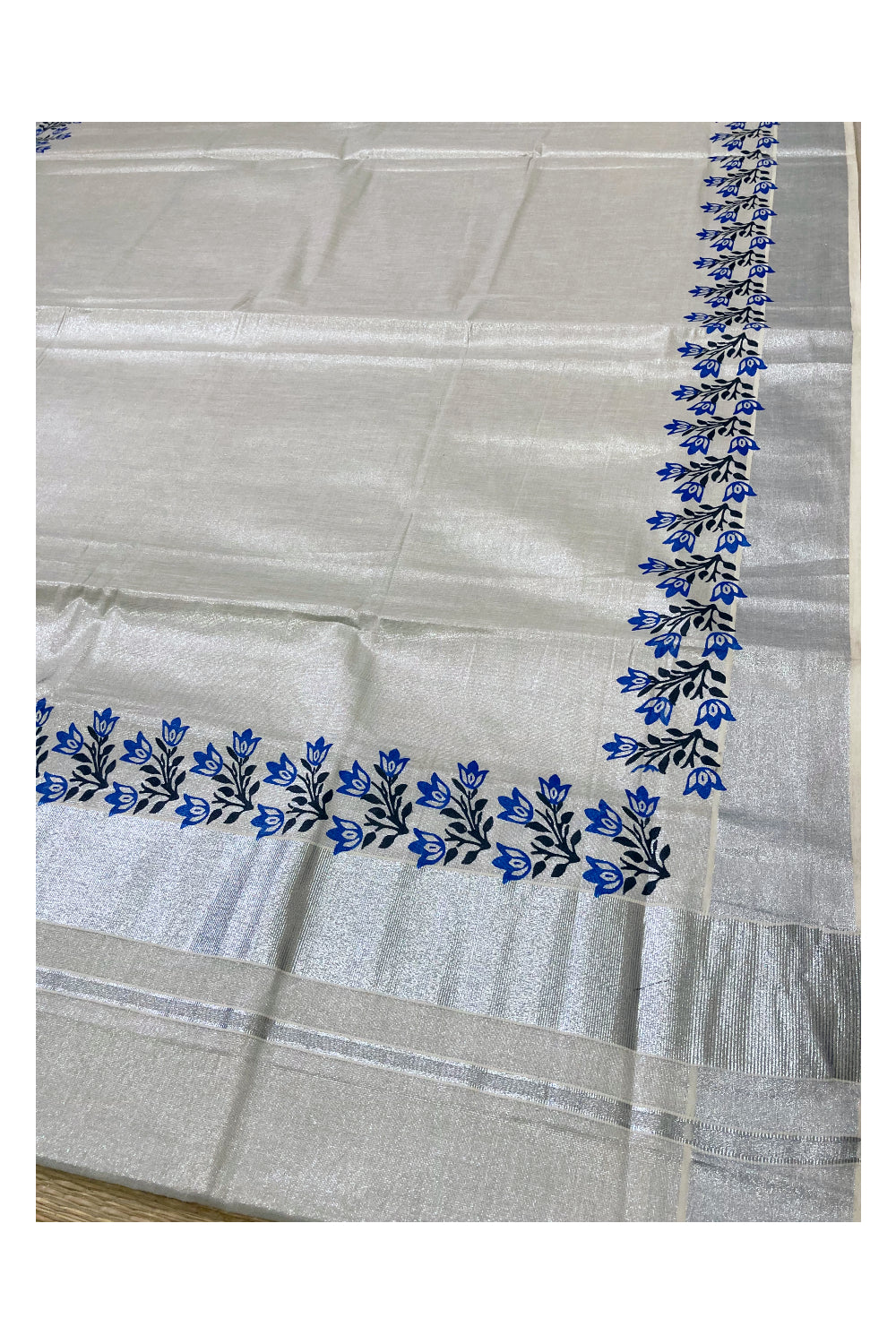 Kerala Silver Tissue Kasavu Saree with Blue and Black Block Prints