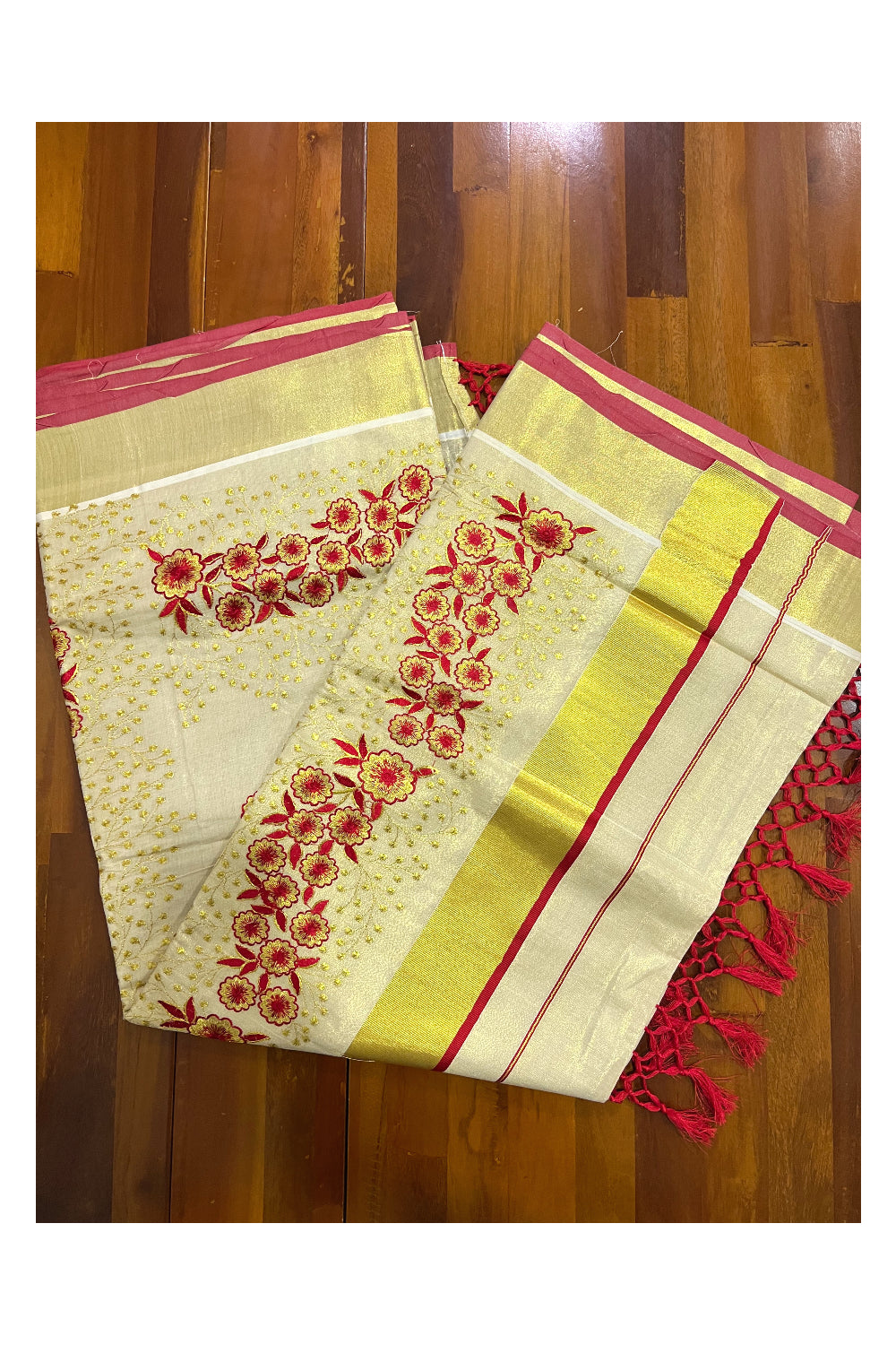 Kerala Tissue Kasavu Heavy Work Saree with Golden and Red Floral Embroidery Design