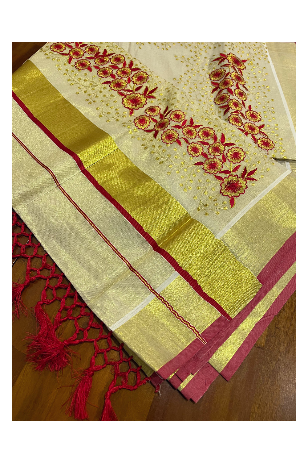 Kerala Tissue Kasavu Heavy Work Saree with Golden and Red Floral Embroidery Design