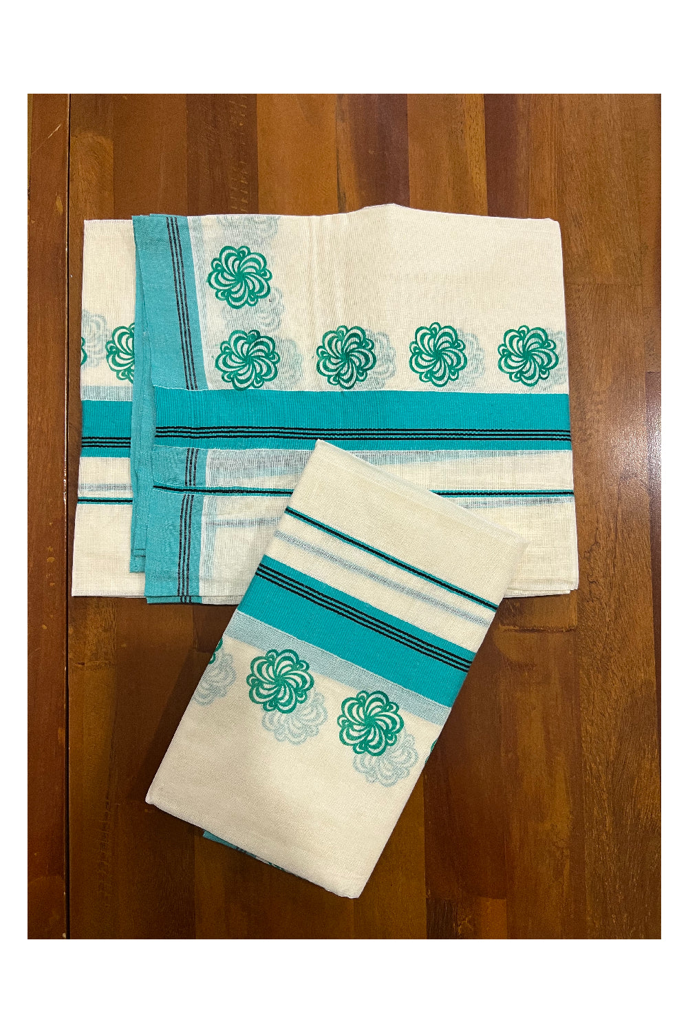 Pure Cotton Set Mundu (Mundum Neriyathum) with Turquoise Floral Block Prints and Black Lines on Border