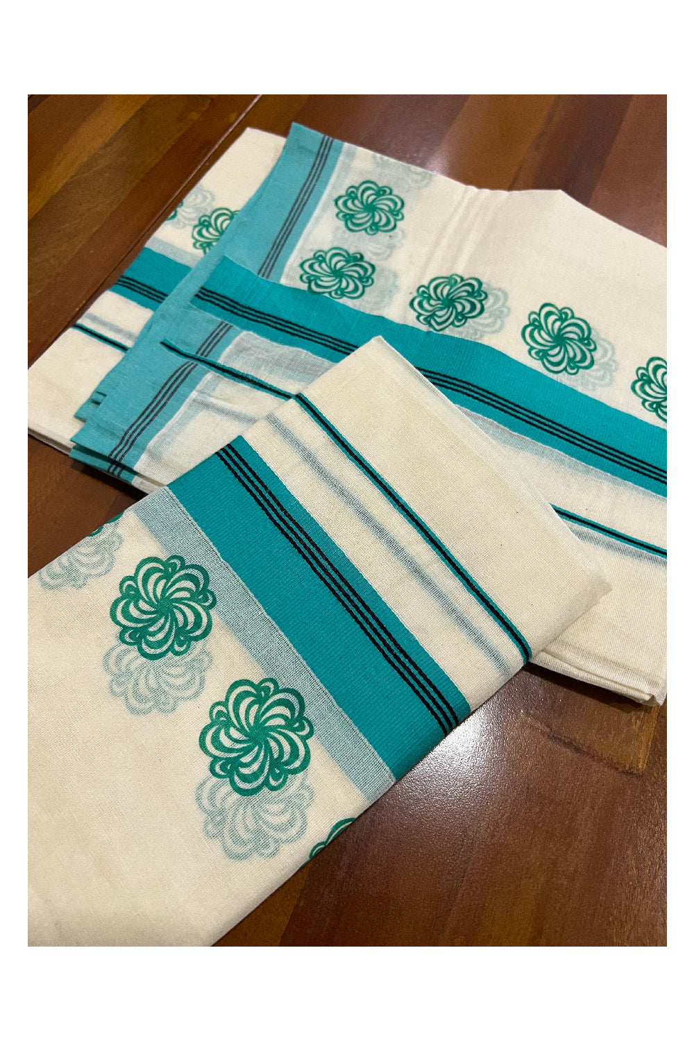 Pure Cotton Set Mundu (Mundum Neriyathum) with Turquoise Floral Block Prints and Black Lines on Border