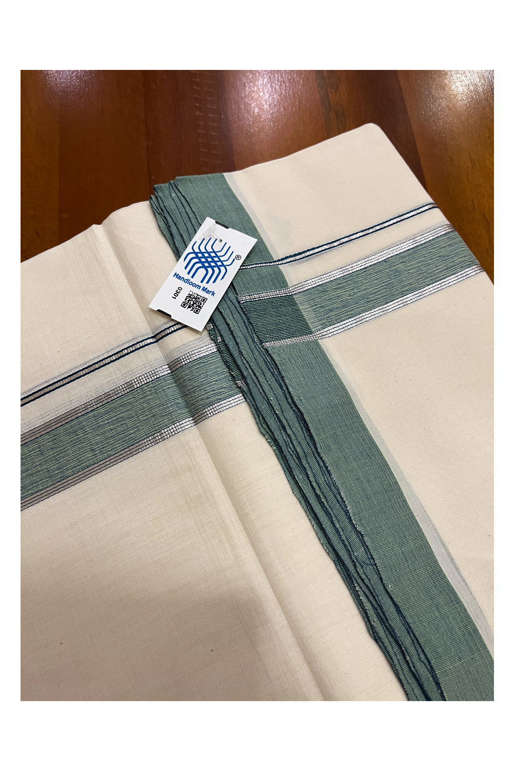 Southloom Premium Unakkupaavu Handloom Mundu with Silver Kasavu and Green Border (South Indian Dhoti)