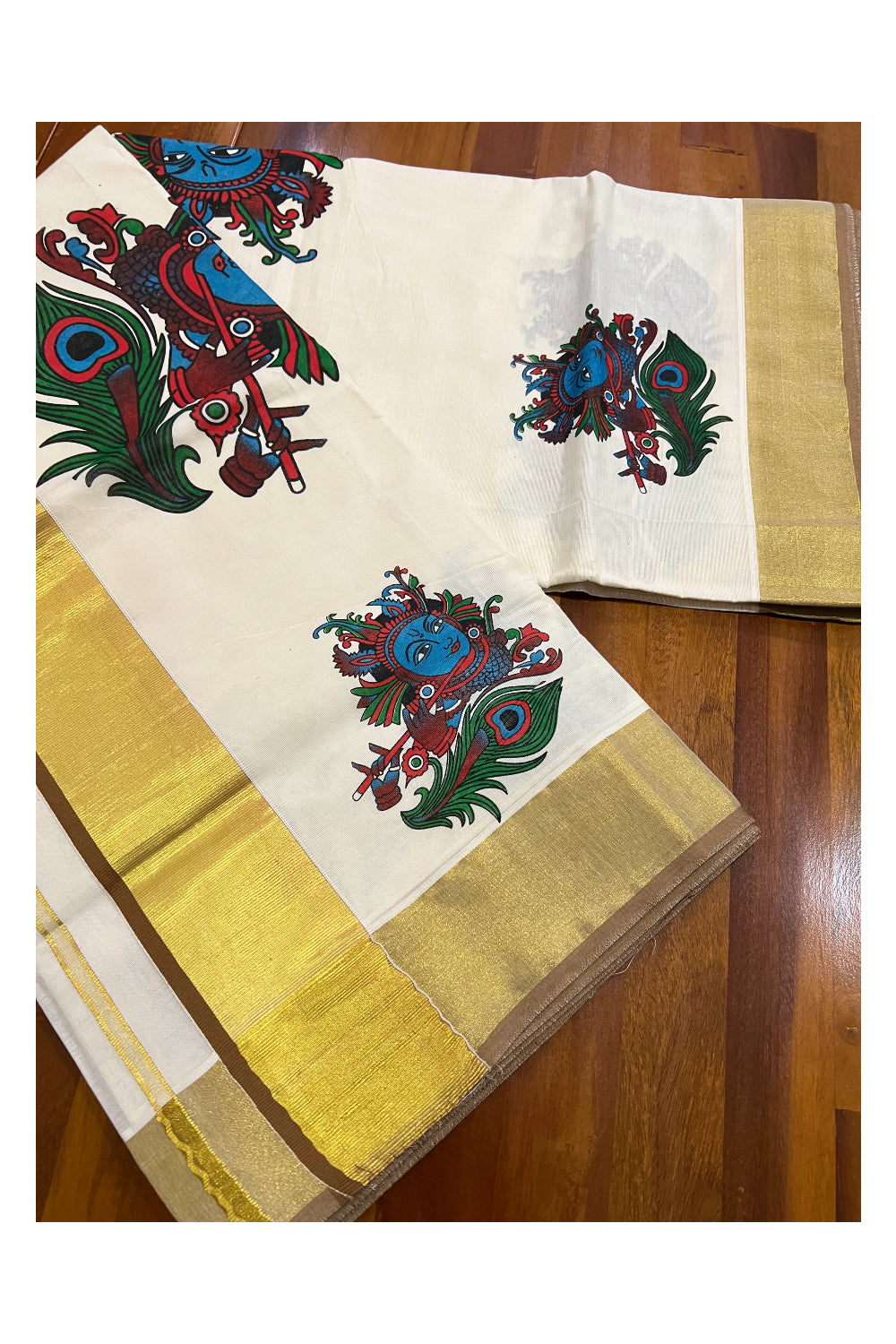 Kerala Pure Cotton Kasavu Saree with Mural Krishna Face and Feather Printed and Light Brown Border