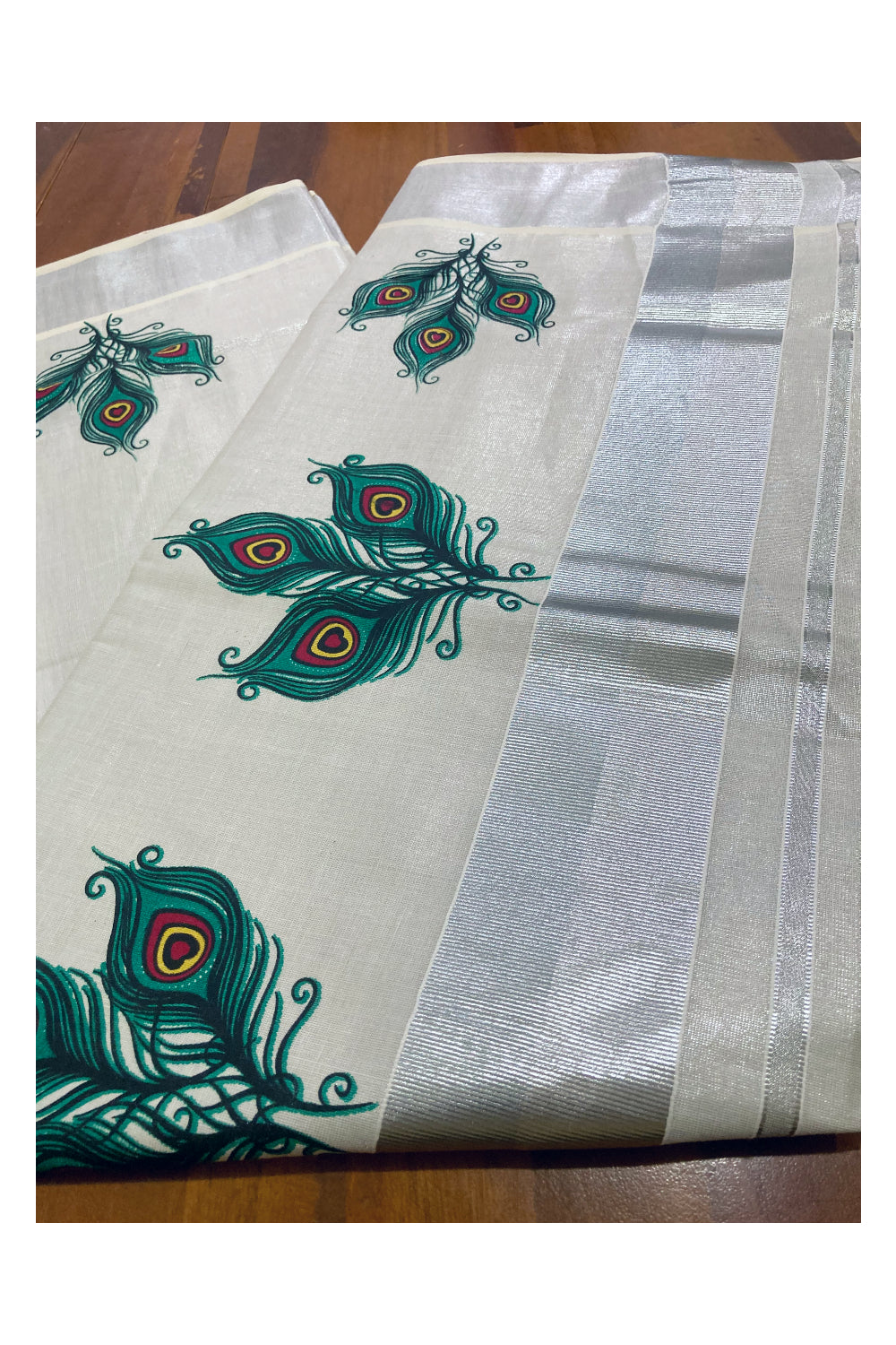 Kerala Silver Tissue Kasavu Saree with Feather Mural Prints