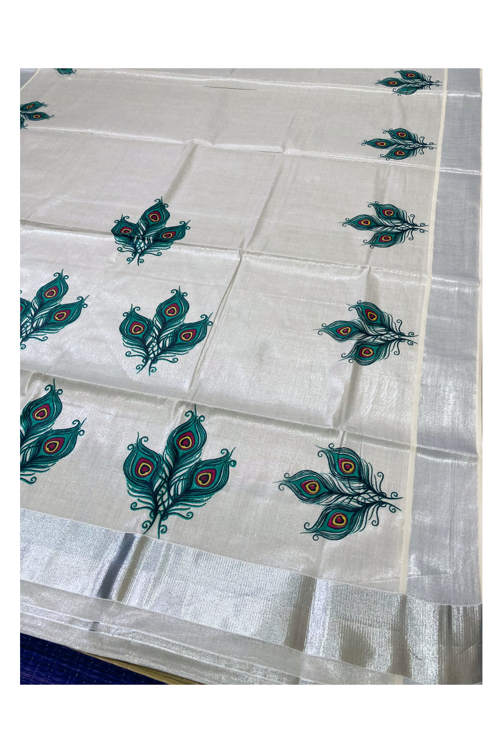 Kerala Silver Tissue Kasavu Saree with Feather Mural Prints