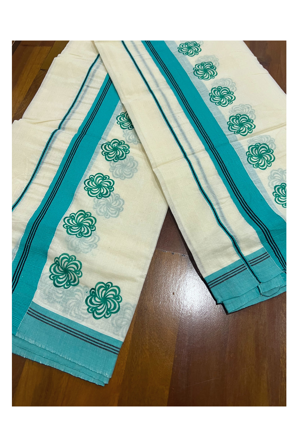 Pure Cotton Set Mundu (Mundum Neriyathum) with Turquoise Floral Block Prints and Black Lines on Border