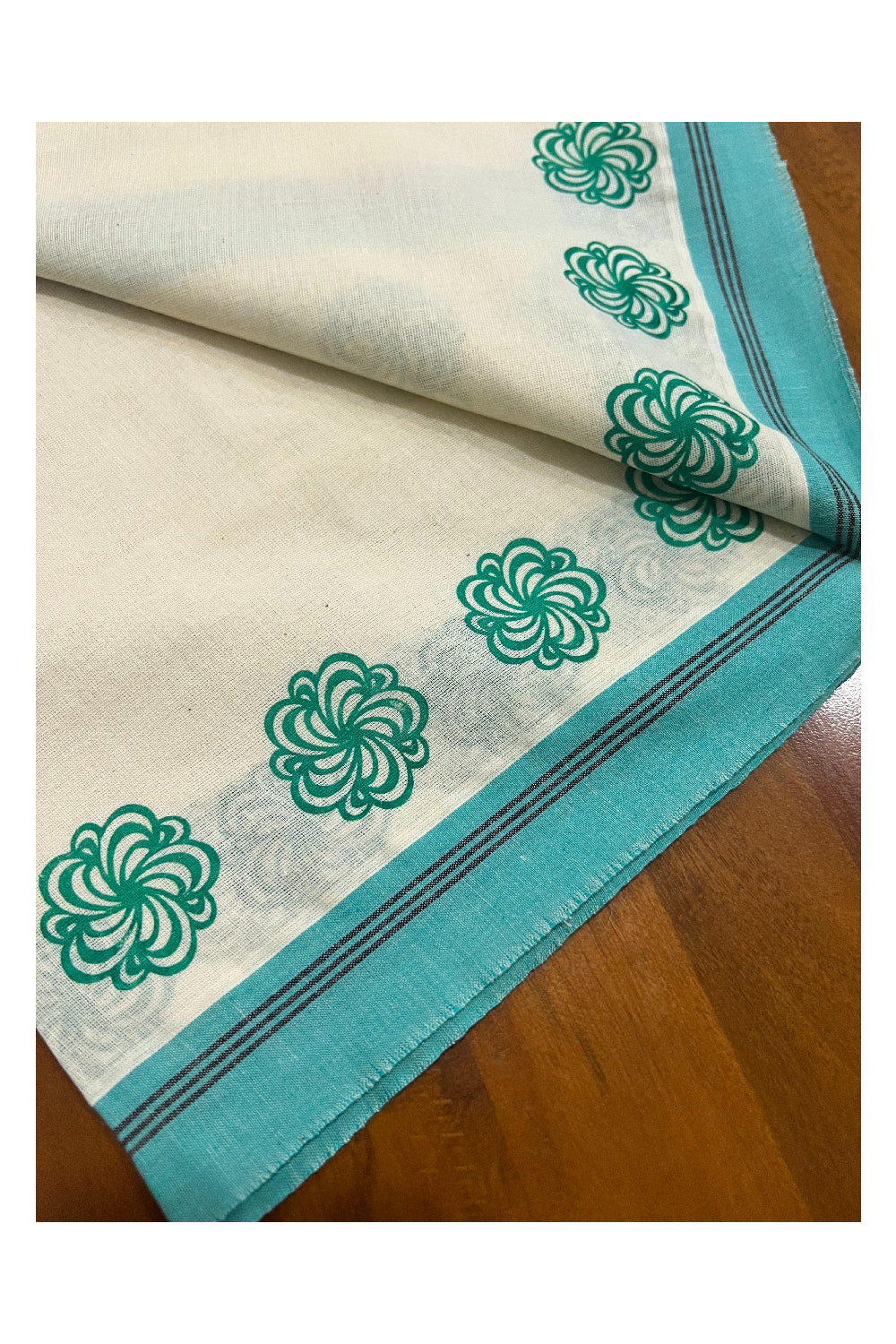 Pure Cotton Set Mundu (Mundum Neriyathum) with Turquoise Floral Block Prints and Black Lines on Border