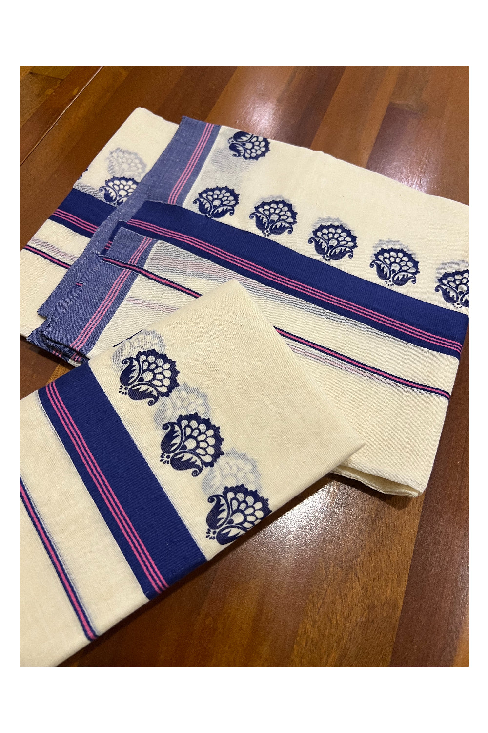 Pure Cotton Set Mundu (Mundum Neriyathum) with Dark Blue Floral Block Prints and Pink Lines on Border