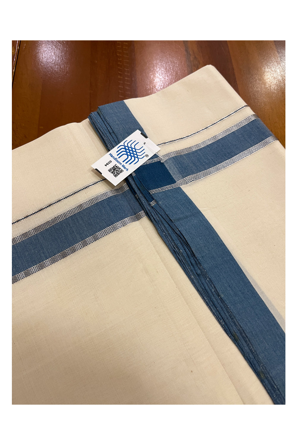 Southloom Premium Unakkupaavu Handloom Mundu with Silver Kasavu and Blue Border (South Indian Dhoti)