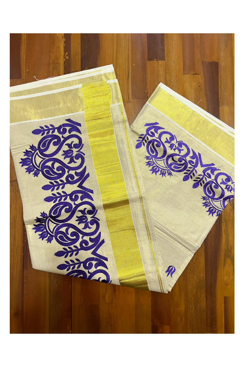 Kerala Tissue Kasavu Saree with Dark Violet Floral Embroidery Design