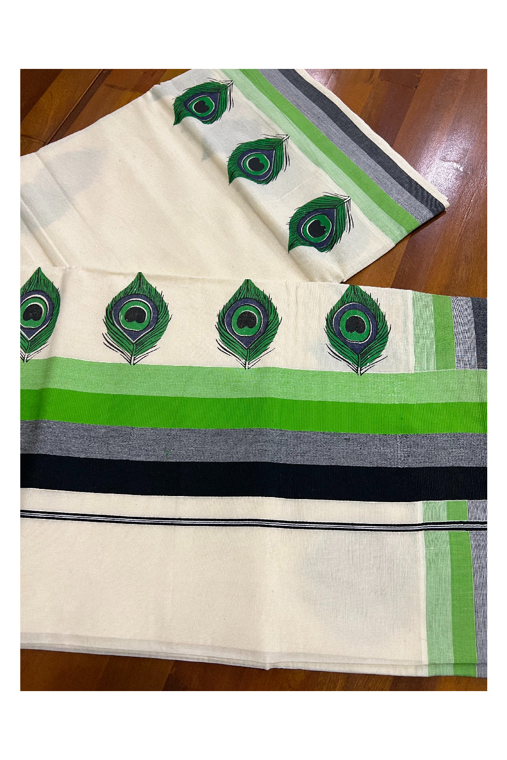 Pure Cotton Light Green and Black Border Kerala Saree with Feather Block Printed Design