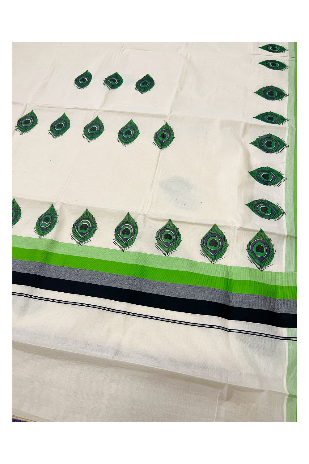 Pure Cotton Light Green and Black Border Kerala Saree with Feather Block Printed Design