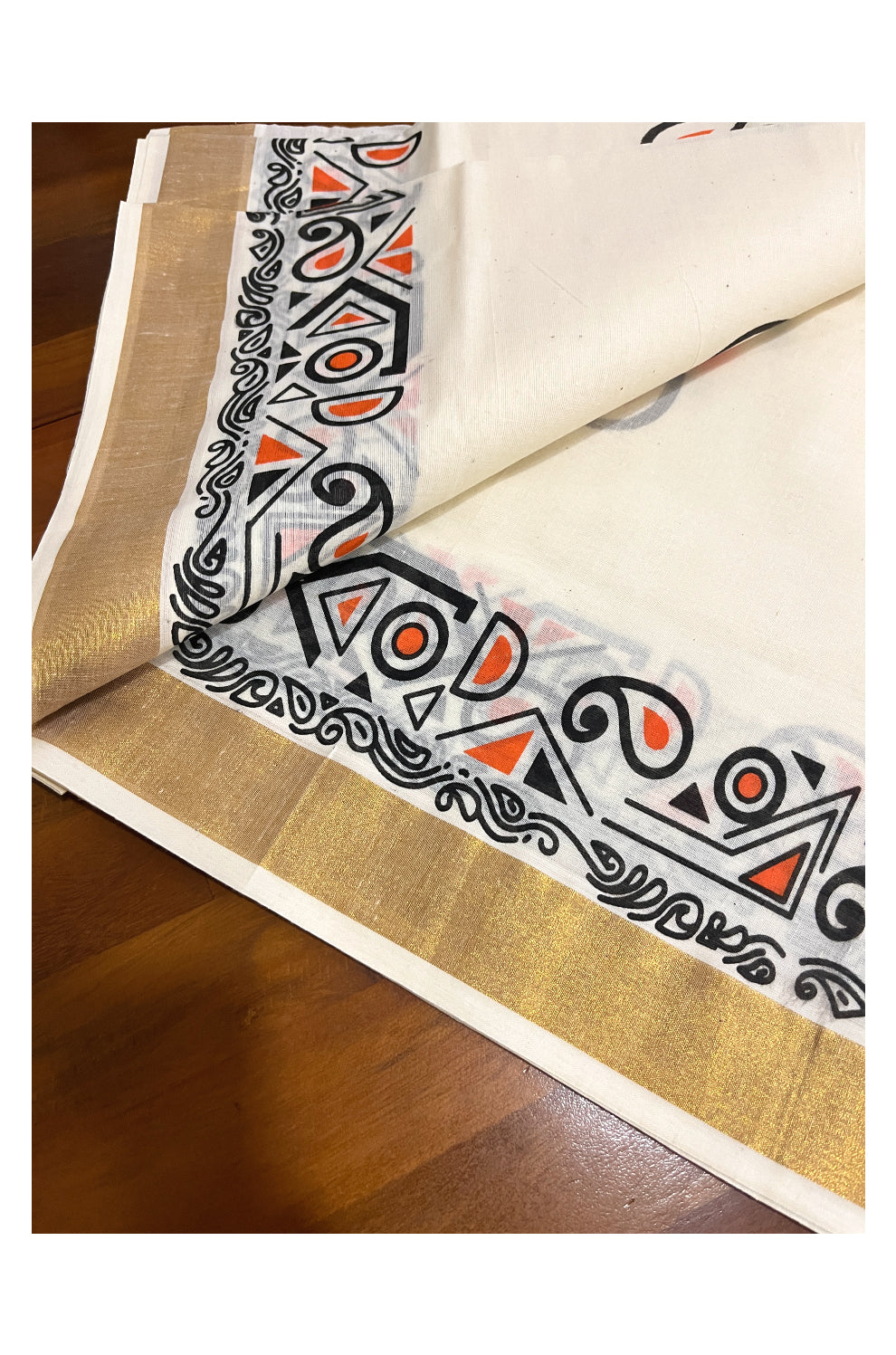 Pure Cotton Off White Kerala Kasavu Saree with Black and Orange Block Prints on Border