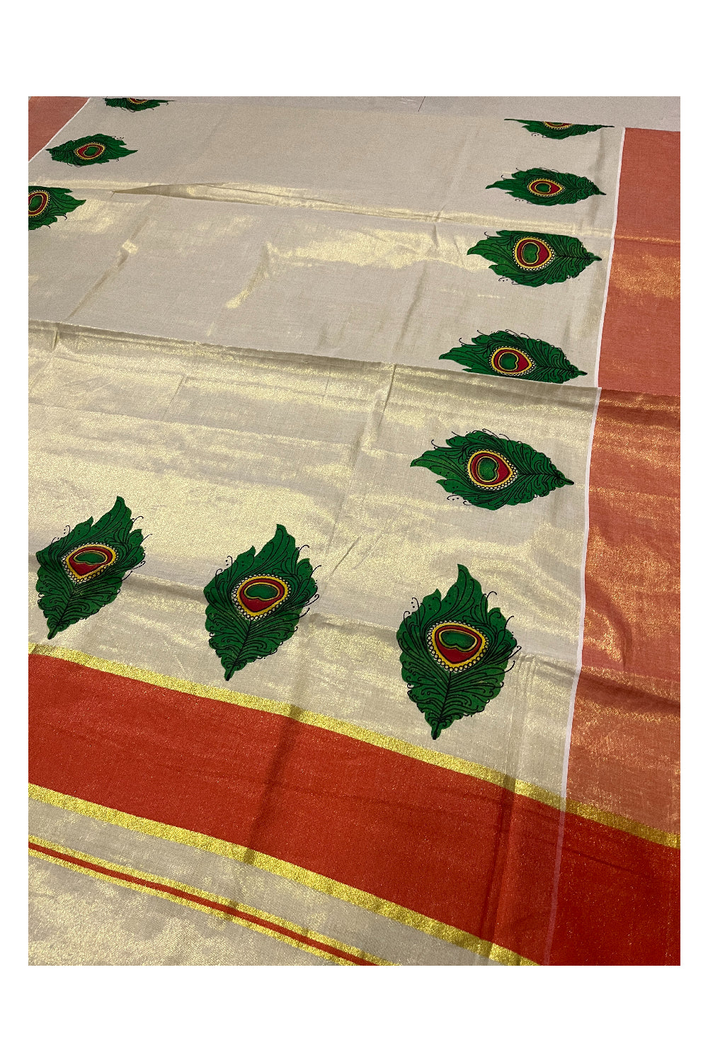 Kerala Tissue Kasavu Peacock Feather Mural Prints and Orange Border Saree