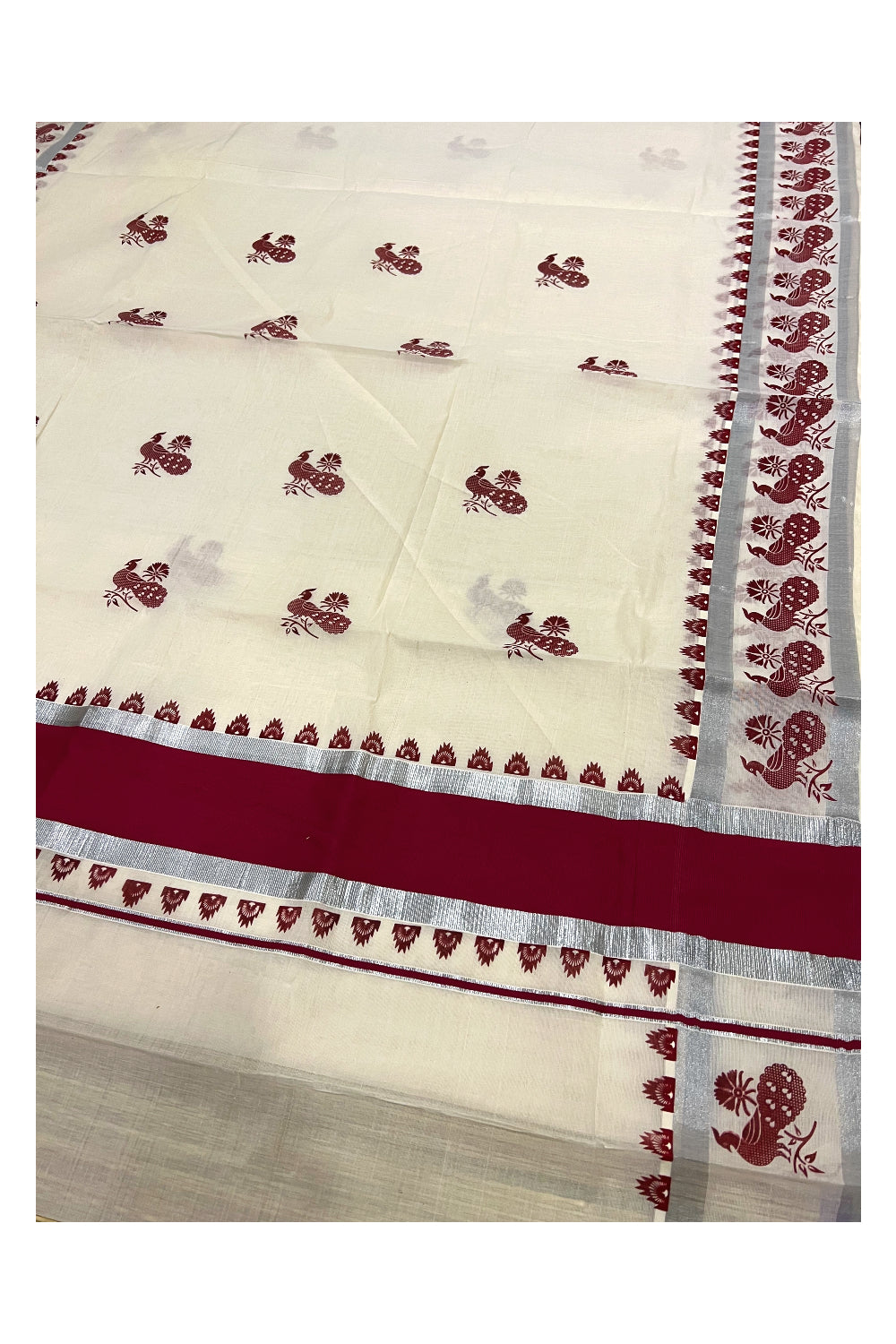 Pure Cotton Kerala Saree with Silver Kasavu and Maroon Peacock Block Prints on Border