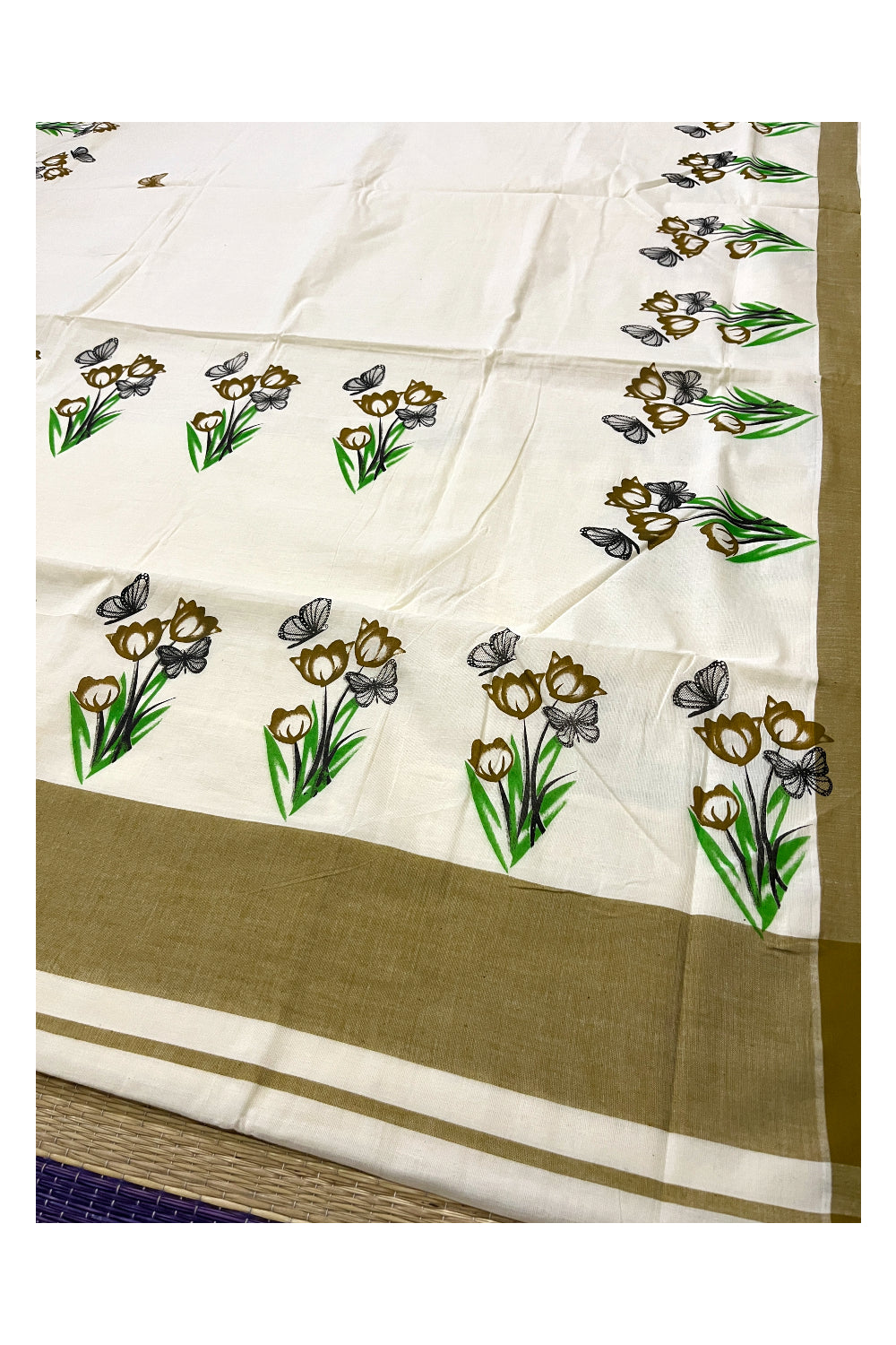 Pure Cotton Kerala Saree with Floral Block Prints and Brown Border