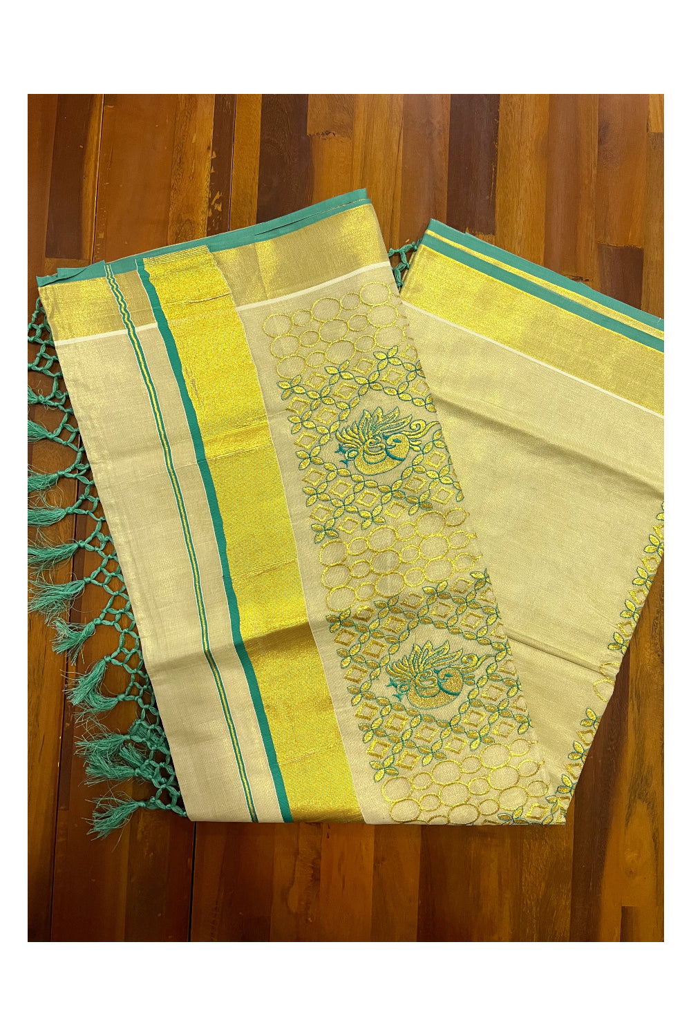 Kerala Tissue Kasavu Heavy Work Saree with Golden and Turquoise Peacock Embroidery Design