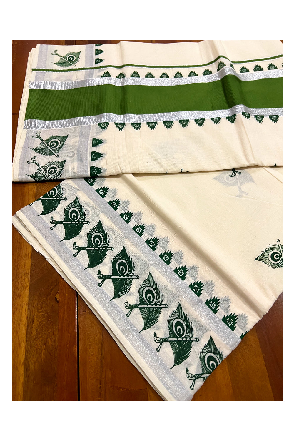 Pure Cotton Kerala Saree with Silver Kasavu and Green Feather Block Prints on Border
