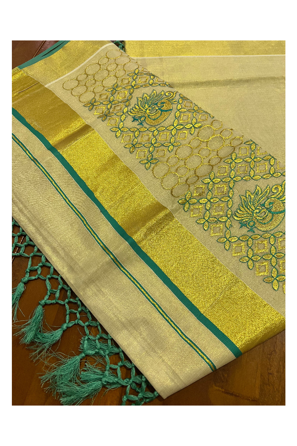 Kerala Tissue Kasavu Heavy Work Saree with Golden and Turquoise Peacock Embroidery Design