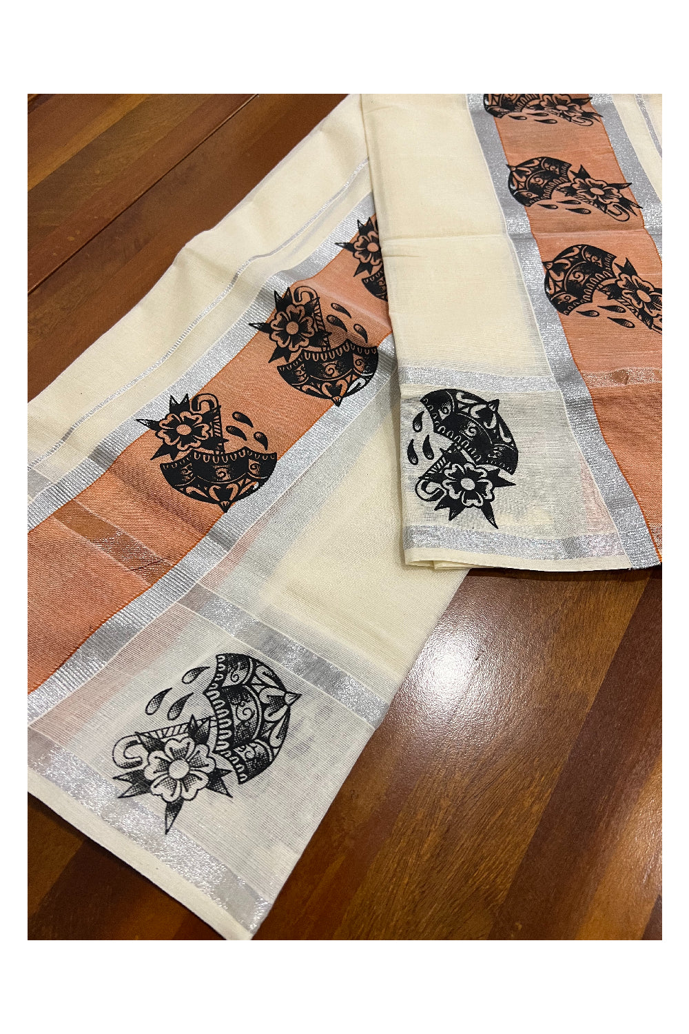 Kerala Cotton Set Mundu (Mundum Neriyathum) with Silver Kasavu and Black Block Prints on Orange Border