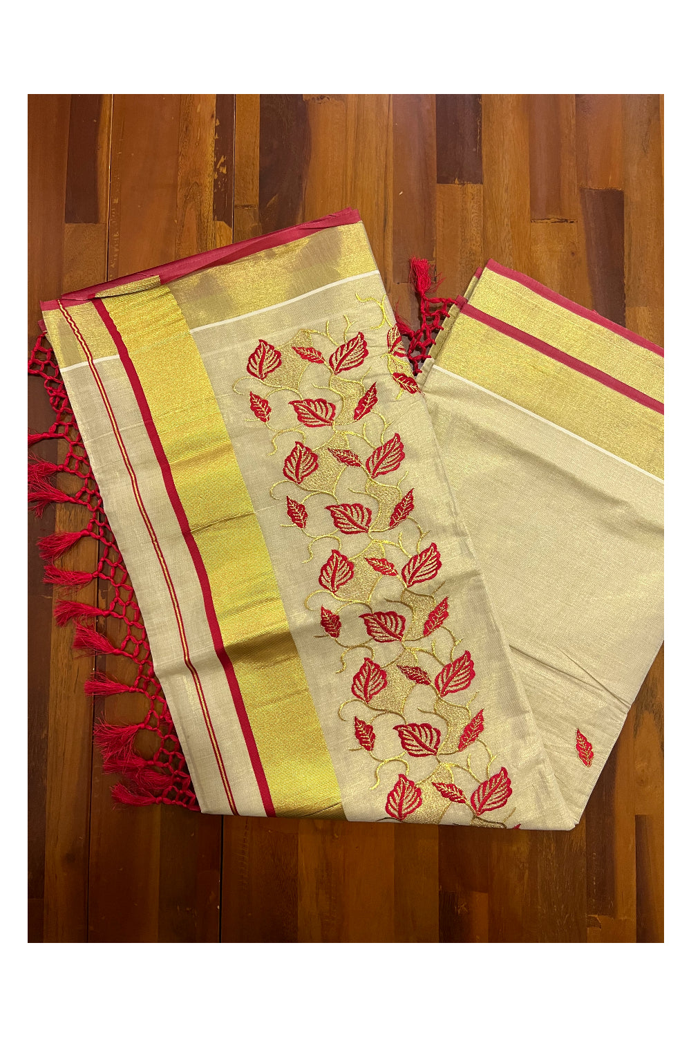 Kerala Tissue Kasavu Heavy Work Saree with Golden and Red Leaf Embroidery Design