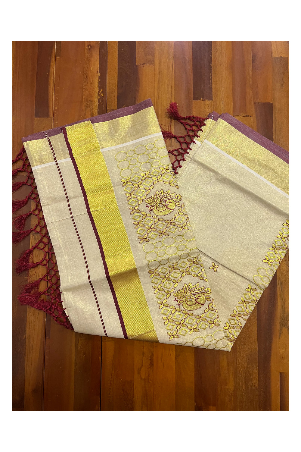 Kerala Tissue Kasavu Heavy Work Saree with Golden and Maroon Peacock Embroidery Design