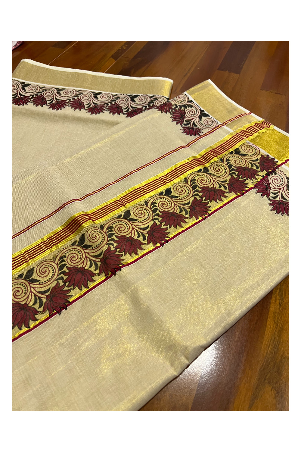 Kerala Tissue Kasavu Saree with Maroon and Black Mural Printed Floral Designs